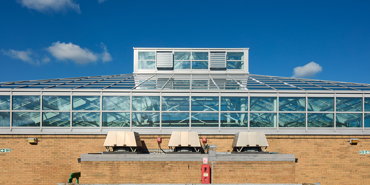 Glass Roof image of shopping centre with vertical uprights