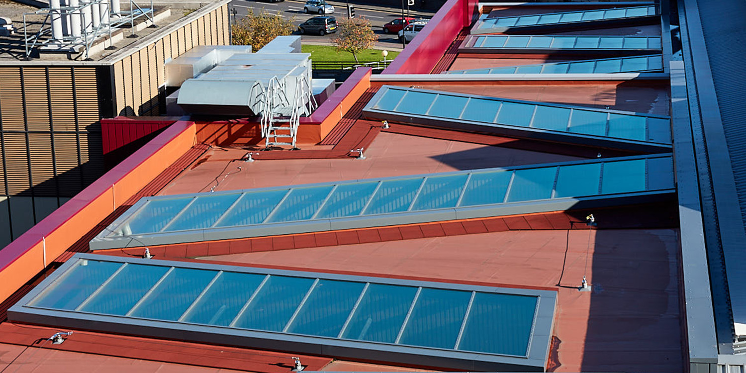 Glass Roof image of university roof with bespoke shaped rooflights
